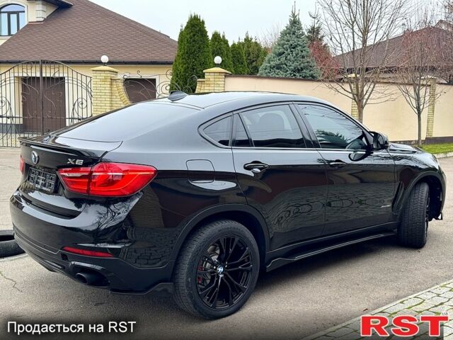 Черный БМВ Х6, объемом двигателя 3 л и пробегом 167 тыс. км за 29999 $, фото 1 на Automoto.ua