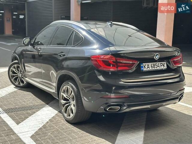 Черный БМВ Х6, объемом двигателя 3 л и пробегом 75 тыс. км за 39300 $, фото 1 на Automoto.ua
