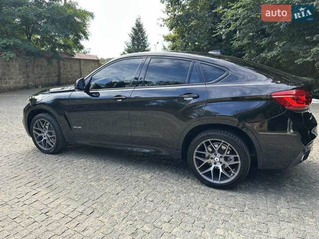 Черный БМВ Х6, объемом двигателя 2.98 л и пробегом 261 тыс. км за 25900 $, фото 4 на Automoto.ua