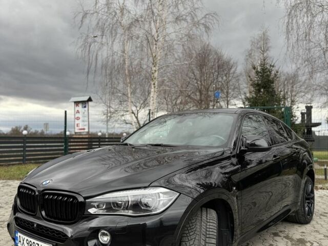 Черный БМВ Х6, объемом двигателя 3 л и пробегом 130 тыс. км за 43000 $, фото 2 на Automoto.ua