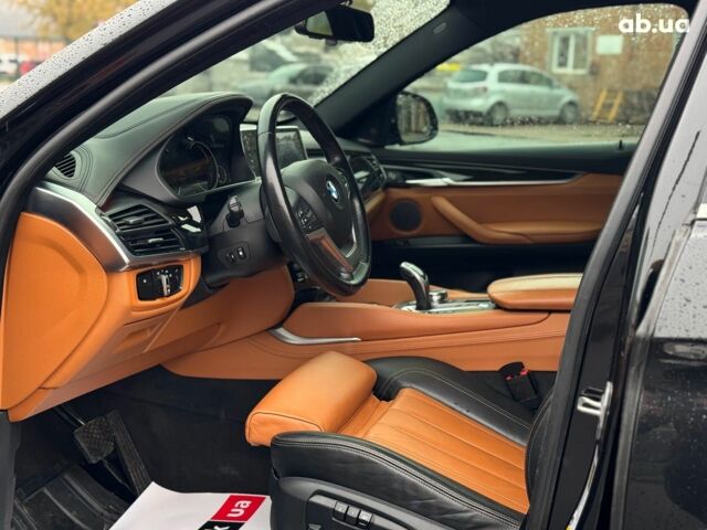 Черный БМВ Х6, объемом двигателя 3 л и пробегом 104 тыс. км за 35490 $, фото 22 на Automoto.ua