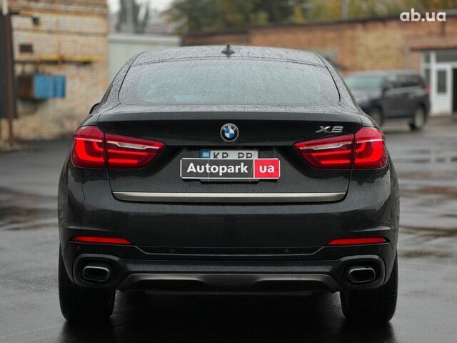 Черный БМВ Х6, объемом двигателя 3 л и пробегом 104 тыс. км за 35490 $, фото 10 на Automoto.ua