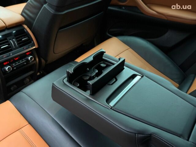 Черный БМВ Х6, объемом двигателя 3 л и пробегом 104 тыс. км за 35490 $, фото 49 на Automoto.ua