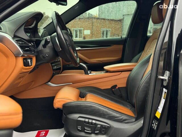 Черный БМВ Х6, объемом двигателя 3 л и пробегом 104 тыс. км за 35490 $, фото 28 на Automoto.ua