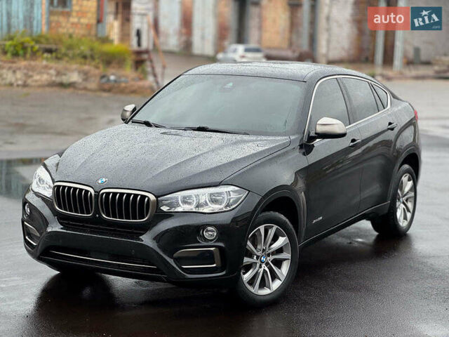 Черный БМВ Х6, объемом двигателя 3 л и пробегом 104 тыс. км за 35490 $, фото 2 на Automoto.ua