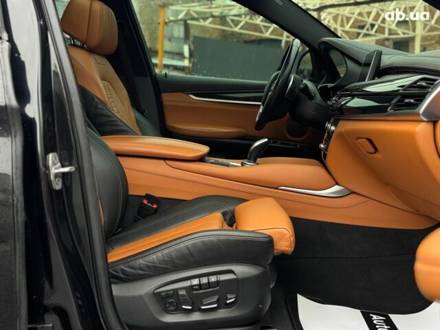 Черный БМВ Х6, объемом двигателя 3 л и пробегом 104 тыс. км за 35490 $, фото 61 на Automoto.ua