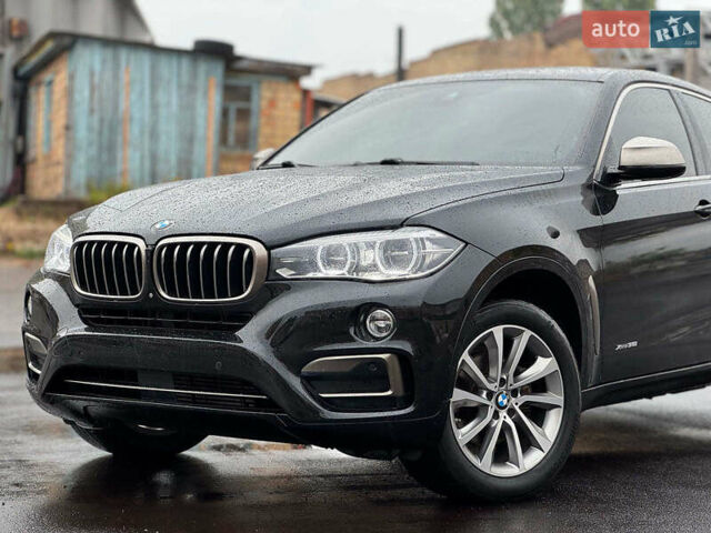 Черный БМВ Х6, объемом двигателя 3 л и пробегом 104 тыс. км за 35490 $, фото 3 на Automoto.ua