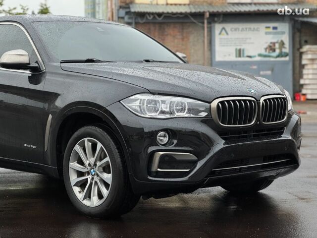 Черный БМВ Х6, объемом двигателя 3 л и пробегом 104 тыс. км за 35490 $, фото 17 на Automoto.ua