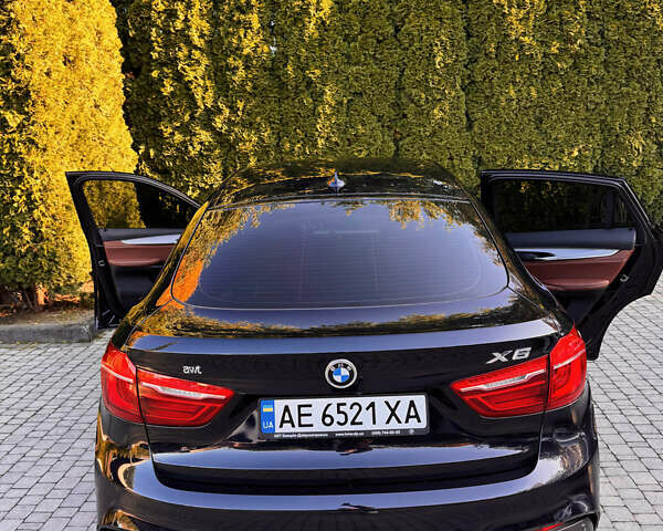 Черный БМВ Х6, объемом двигателя 2.98 л и пробегом 66 тыс. км за 55000 $, фото 4 на Automoto.ua