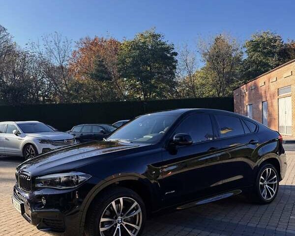 Черный БМВ Х6, объемом двигателя 2.98 л и пробегом 66 тыс. км за 55000 $, фото 2 на Automoto.ua