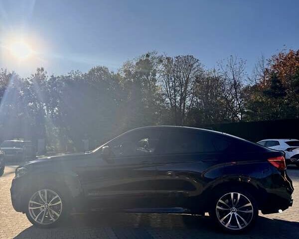 Черный БМВ Х6, объемом двигателя 2.98 л и пробегом 66 тыс. км за 55000 $, фото 5 на Automoto.ua