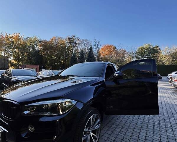 Черный БМВ Х6, объемом двигателя 2.98 л и пробегом 66 тыс. км за 55000 $, фото 1 на Automoto.ua
