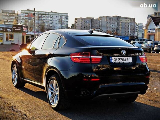 Чорний БМВ Х6, об'ємом двигуна 3 л та пробігом 155 тис. км за 23800 $, фото 3 на Automoto.ua
