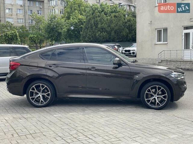 Коричневый БМВ Х6, объемом двигателя 2.99 л и пробегом 134 тыс. км за 35500 $, фото 9 на Automoto.ua