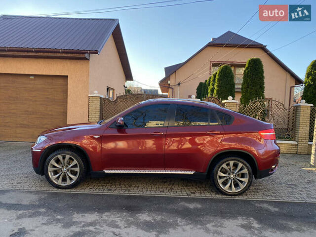 Красный БМВ Х6, объемом двигателя 3 л и пробегом 240 тыс. км за 15000 $, фото 1 на Automoto.ua