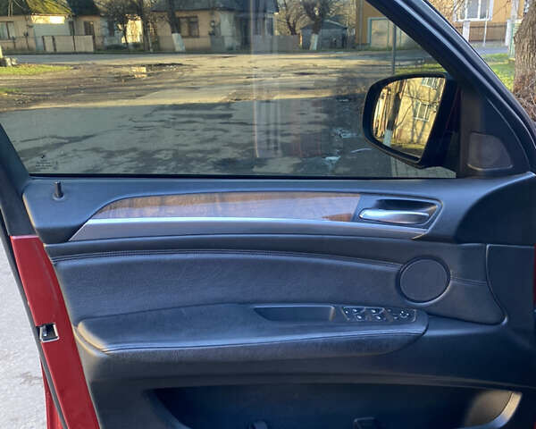 Красный БМВ Х6, объемом двигателя 3 л и пробегом 240 тыс. км за 15000 $, фото 23 на Automoto.ua