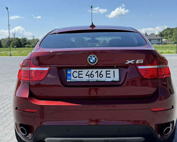 Красный БМВ Х6, объемом двигателя 3 л и пробегом 240 тыс. км за 16500 $, фото 3 на Automoto.ua