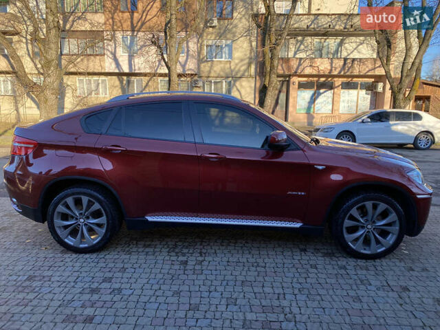 Красный БМВ Х6, объемом двигателя 3 л и пробегом 240 тыс. км за 15000 $, фото 5 на Automoto.ua