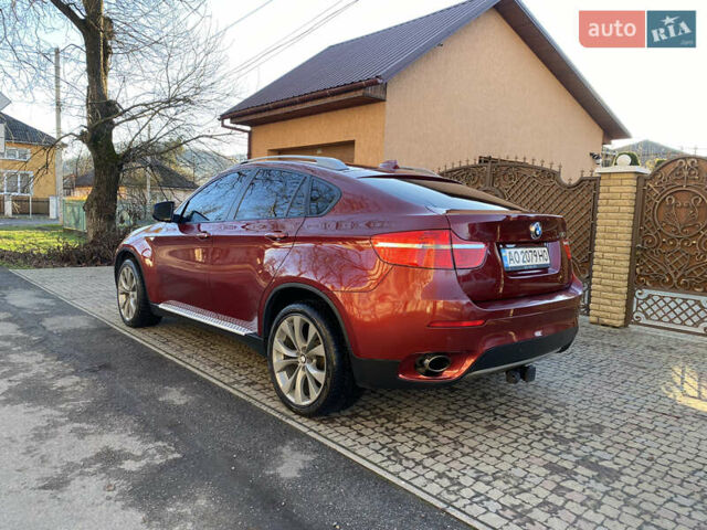 Красный БМВ Х6, объемом двигателя 3 л и пробегом 240 тыс. км за 15000 $, фото 2 на Automoto.ua