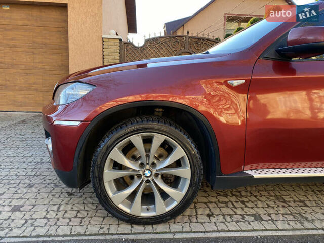 Красный БМВ Х6, объемом двигателя 3 л и пробегом 240 тыс. км за 15000 $, фото 9 на Automoto.ua