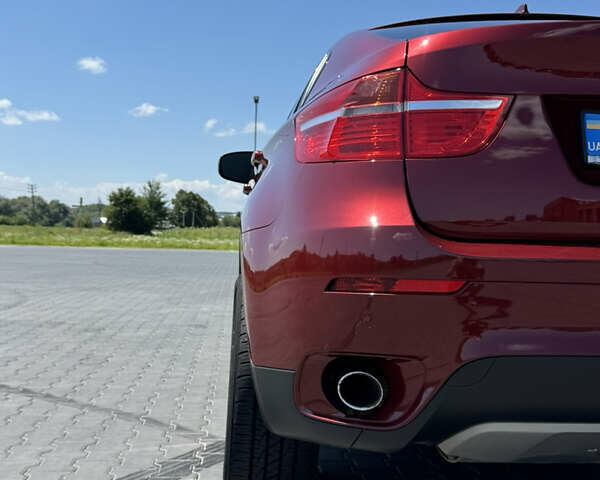 Красный БМВ Х6, объемом двигателя 3 л и пробегом 240 тыс. км за 16500 $, фото 4 на Automoto.ua