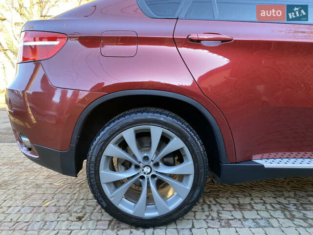Красный БМВ Х6, объемом двигателя 3 л и пробегом 240 тыс. км за 15000 $, фото 12 на Automoto.ua