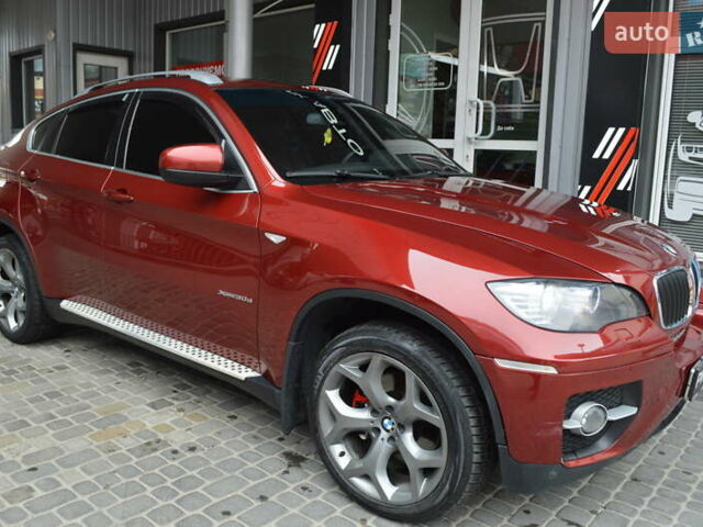 Красный БМВ Х6, объемом двигателя 3 л и пробегом 249 тыс. км за 15900 $, фото 1 на Automoto.ua