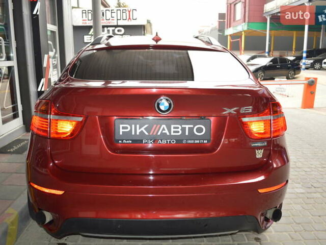 Красный БМВ Х6, объемом двигателя 3 л и пробегом 249 тыс. км за 15900 $, фото 6 на Automoto.ua