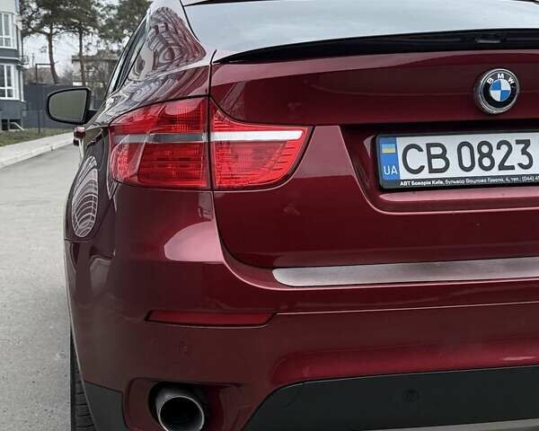 Красный БМВ Х6, объемом двигателя 3 л и пробегом 182 тыс. км за 15550 $, фото 8 на Automoto.ua
