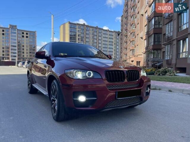 Красный БМВ Х6, объемом двигателя 3 л и пробегом 187 тыс. км за 12999 $, фото 1 на Automoto.ua