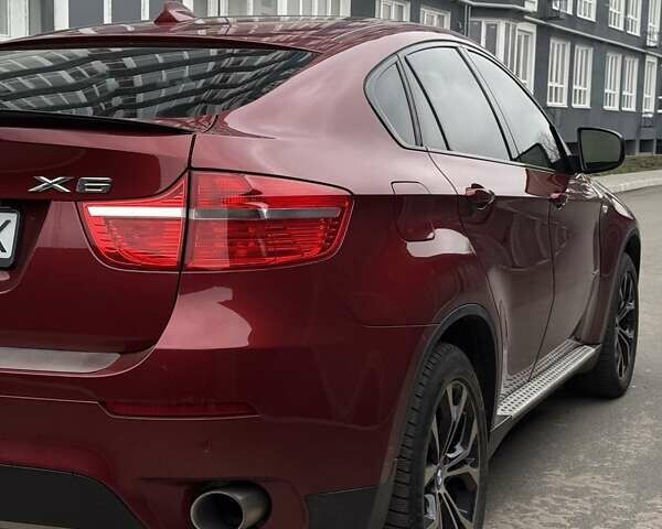 Красный БМВ Х6, объемом двигателя 3 л и пробегом 182 тыс. км за 15550 $, фото 16 на Automoto.ua