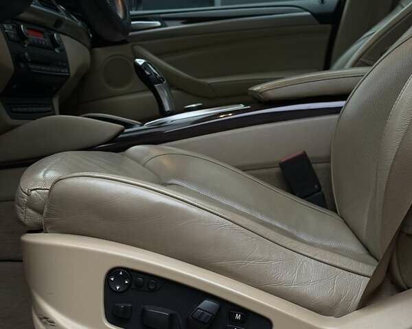 Красный БМВ Х6, объемом двигателя 3 л и пробегом 182 тыс. км за 15550 $, фото 29 на Automoto.ua