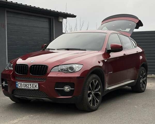 Красный БМВ Х6, объемом двигателя 3 л и пробегом 182 тыс. км за 15550 $, фото 2 на Automoto.ua