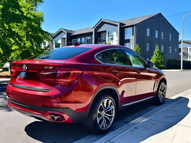 Красный БМВ Х6, объемом двигателя 3 л и пробегом 76 тыс. км за 7400 $, фото 4 на Automoto.ua