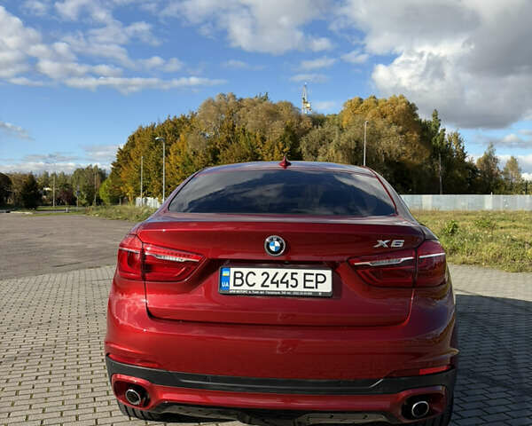 Красный БМВ Х6, объемом двигателя 2.99 л и пробегом 111 тыс. км за 40500 $, фото 6 на Automoto.ua