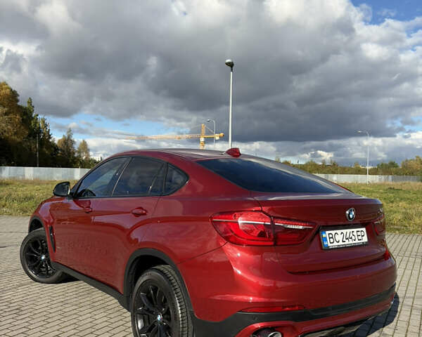 Красный БМВ Х6, объемом двигателя 2.99 л и пробегом 111 тыс. км за 40500 $, фото 5 на Automoto.ua