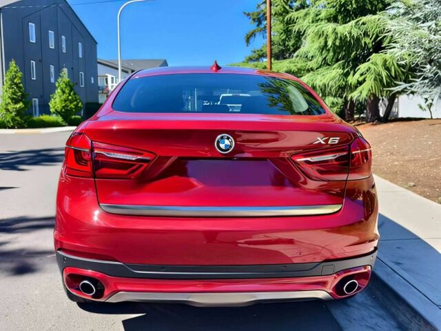 Красный БМВ Х6, объемом двигателя 3 л и пробегом 76 тыс. км за 7400 $, фото 5 на Automoto.ua