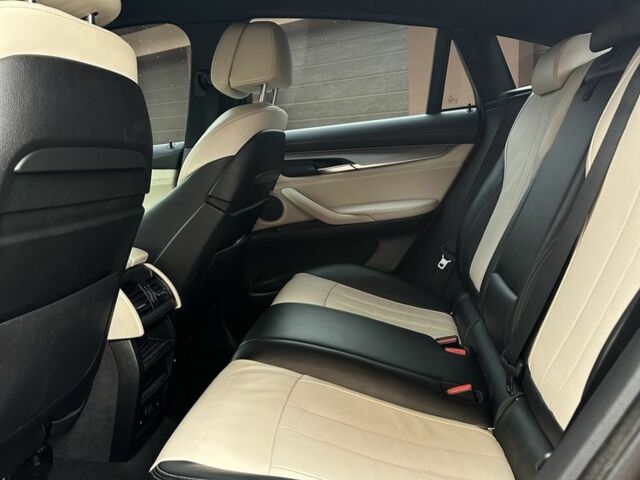 Красный БМВ Х6, объемом двигателя 3 л и пробегом 157 тыс. км за 42500 $, фото 5 на Automoto.ua