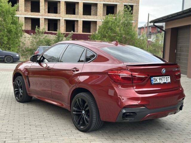 Красный БМВ Х6, объемом двигателя 3 л и пробегом 157 тыс. км за 42500 $, фото 3 на Automoto.ua