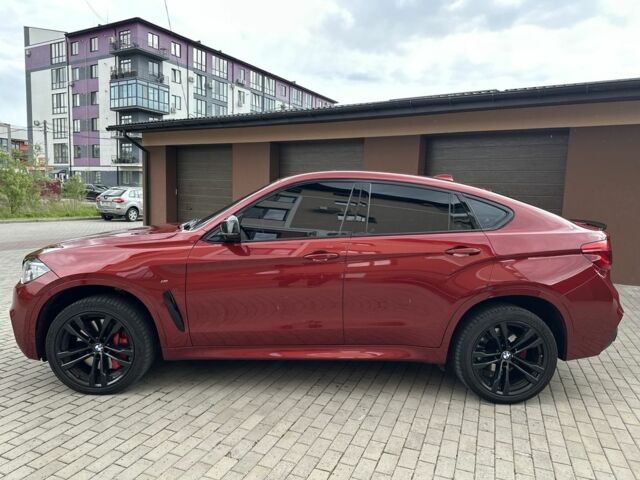 Красный БМВ Х6, объемом двигателя 3 л и пробегом 157 тыс. км за 42500 $, фото 1 на Automoto.ua