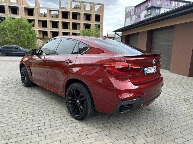 Красный БМВ Х6, объемом двигателя 3 л и пробегом 157 тыс. км за 42500 $, фото 2 на Automoto.ua