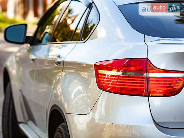 Серый БМВ Х6, объемом двигателя 3 л и пробегом 180 тыс. км за 18500 $, фото 4 на Automoto.ua