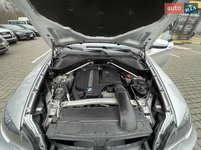 Серый БМВ Х6, объемом двигателя 3 л и пробегом 130 тыс. км за 15500 $, фото 13 на Automoto.ua
