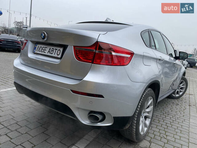 Серый БМВ Х6, объемом двигателя 3 л и пробегом 130 тыс. км за 15500 $, фото 2 на Automoto.ua