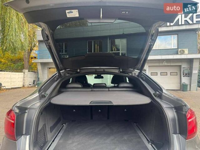 Серый БМВ Х6, объемом двигателя 2.98 л и пробегом 128 тыс. км за 28500 $, фото 5 на Automoto.ua