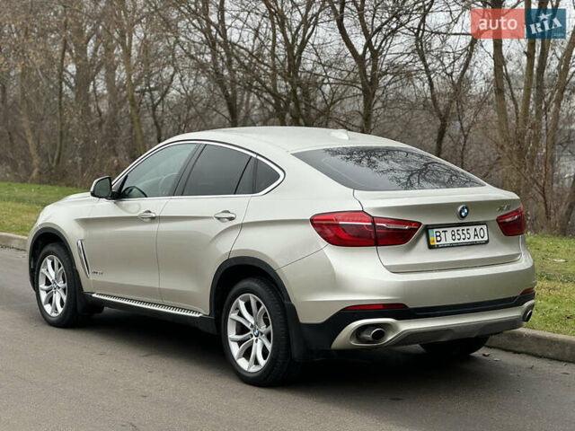 Серый БМВ Х6, объемом двигателя 3 л и пробегом 79 тыс. км за 38900 $, фото 5 на Automoto.ua