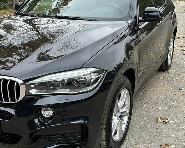 Синий БМВ Х6, объемом двигателя 4.39 л и пробегом 96 тыс. км за 30000 $, фото 24 на Automoto.ua