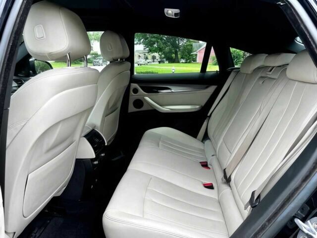 Синій БМВ Х6, об'ємом двигуна 3 л та пробігом 65 тис. км за 12000 $, фото 21 на Automoto.ua