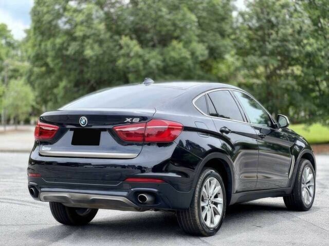 Синій БМВ Х6, об'ємом двигуна 3 л та пробігом 65 тис. км за 12000 $, фото 4 на Automoto.ua