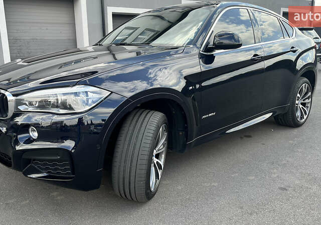 Синий БМВ Х6, объемом двигателя 2.99 л и пробегом 83 тыс. км за 50100 $, фото 3 на Automoto.ua